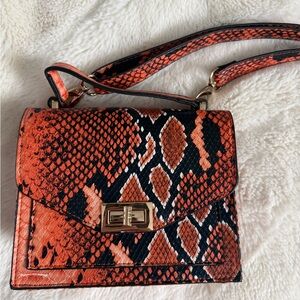 Stylish Orange and Black Snake Print Women's Bag